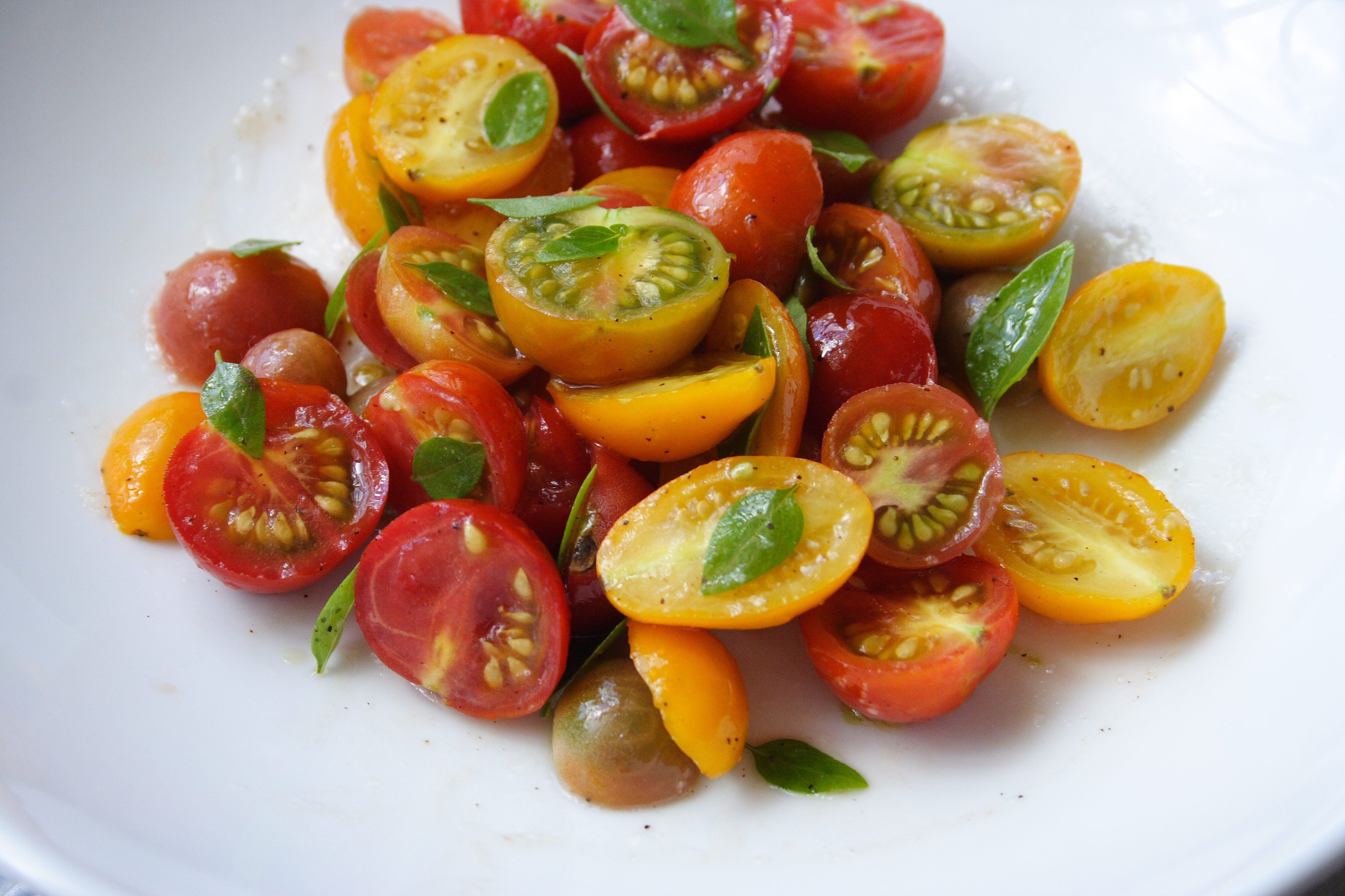 Plated cherry tomato salad.