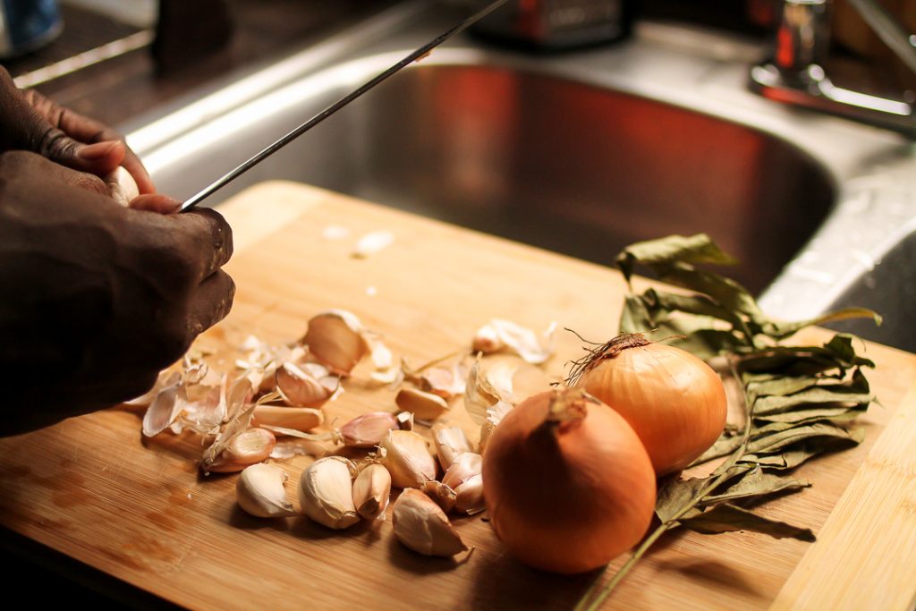 Baidawi Assing prepping his seasonings.